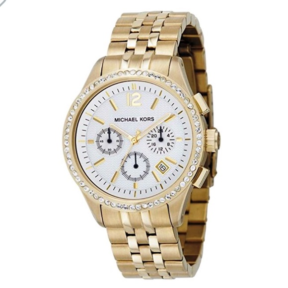 Michael Kors women’s gold watch with bezels